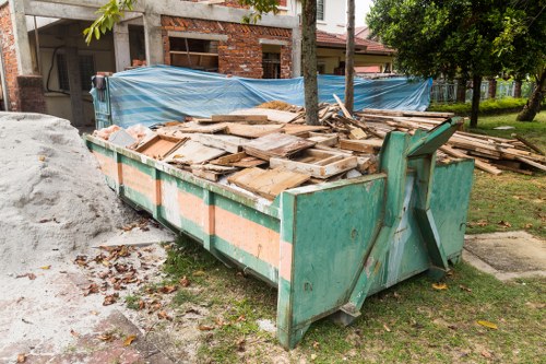 Enclosed and lockable skip placed in a Dulwich residential area