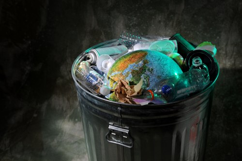 People loading waste into a skip in Dulwich